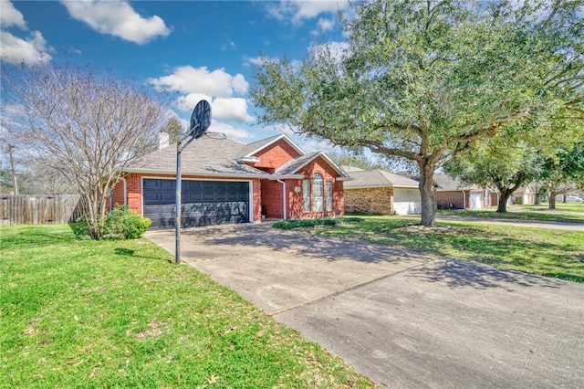 ranch-style house with brick siding, driveway, a front yard, and fence