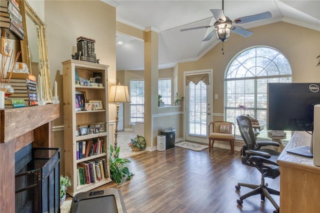 office with plenty of natural light, a fireplace, lofted ceiling, and wood finished floors