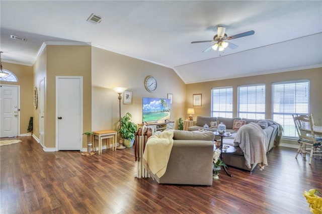 living room with ornamental molding, dark wood-style floors, visible vents, and baseboards