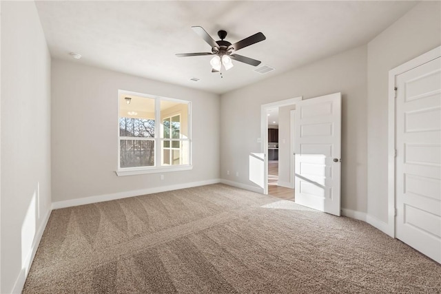 unfurnished bedroom with ceiling fan and carpet