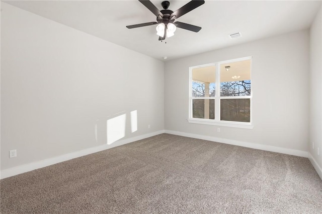 unfurnished room with carpet flooring and ceiling fan