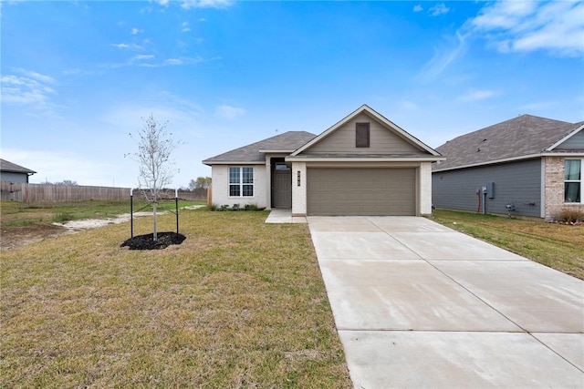 view of front of house with a front lawn and a garage