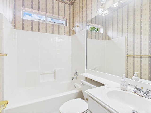 5614 Thomas Nelson Dr, Tyler, TX 75707 - bathroom with wallpapered walls, vanity, and washtub / shower combination