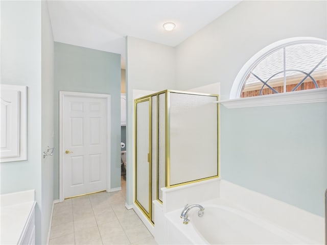 5614 Thomas Nelson Dr, Tyler, TX 75707 - full bath featuring a shower stall, a garden tub, tile patterned floors, and vanity