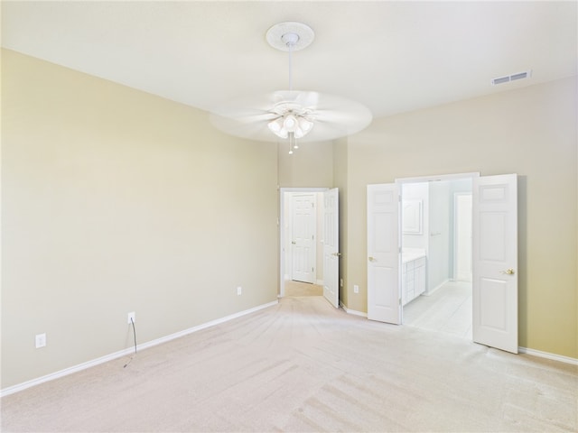5614 Thomas Nelson Dr, Tyler, TX 75707 - unfurnished bedroom featuring light carpet and a ceiling fan