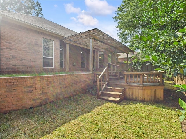5614 Thomas Nelson Dr, Tyler, TX 75707 - rear view of property with a pergola, a wooden deck, brick siding, and a shingled roof