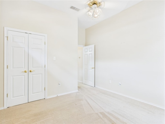 5614 Thomas Nelson Dr, Tyler, TX 75707 - unfurnished bedroom featuring light carpet and a closet