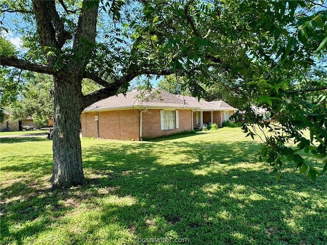 exterior space featuring a yard