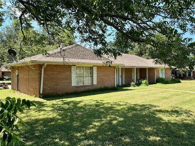 exterior space featuring a front lawn