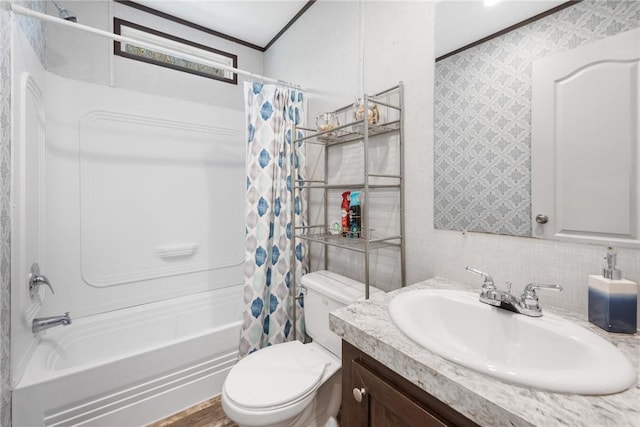 bathroom featuring toilet, ornamental molding, vanity, and shower / bath combination with curtain