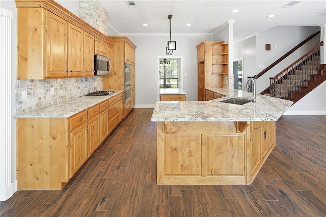 kitchen featuring light stone countertops, stainless steel appliances, kitchen peninsula, and dark hardwood / wood-style floors