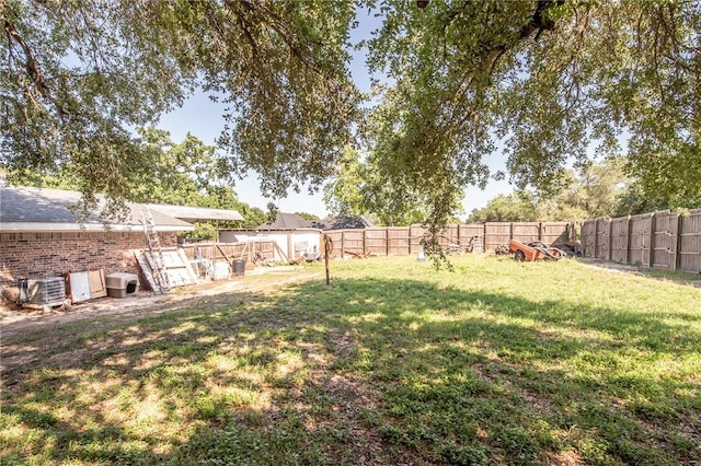 885 7th St, Somerville, TX 77879 - view of yard with central AC