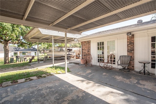885 7th St, Somerville, TX 77879 - view of patio / terrace featuring a carport