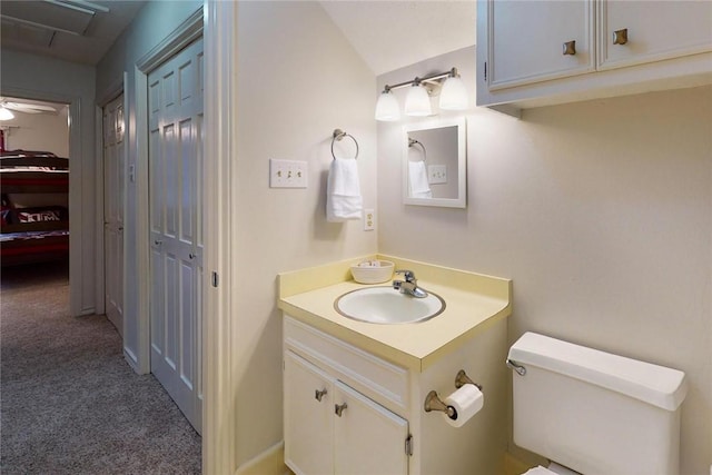 bathroom with vanity and toilet