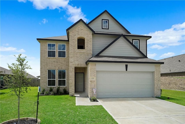 view of front of home with a garage and a front lawn