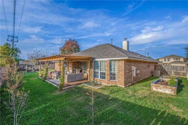 back of property with a lawn, a pergola, outdoor lounge area, a patio, and central air condition unit