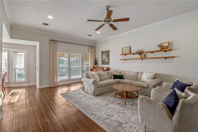 living room with crown molding, ceiling fan, and hardwood / wood-style floors