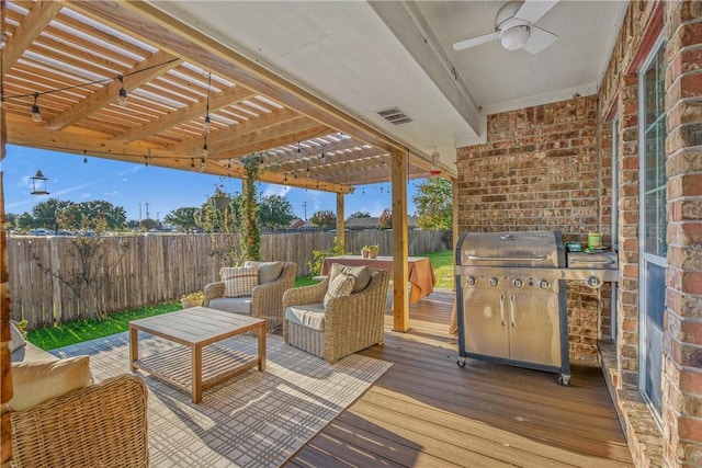 wooden terrace with grilling area, a pergola, an outdoor hangout area, and ceiling fan