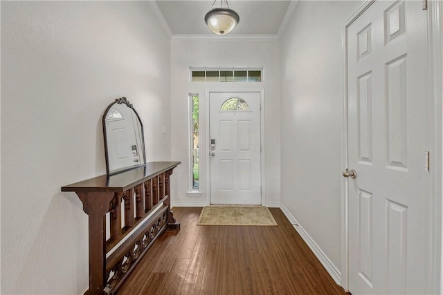 entrance foyer featuring crown molding and dark hardwood / wood-style floors