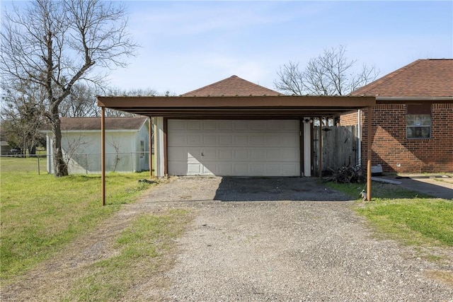 detached garage with fence