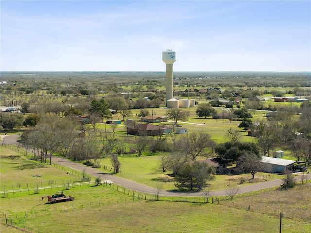 birds eye view of property featuring a rural view