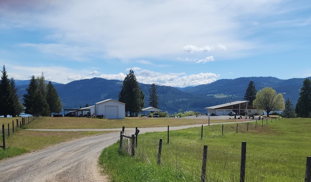 property view of mountains featuring a rural view