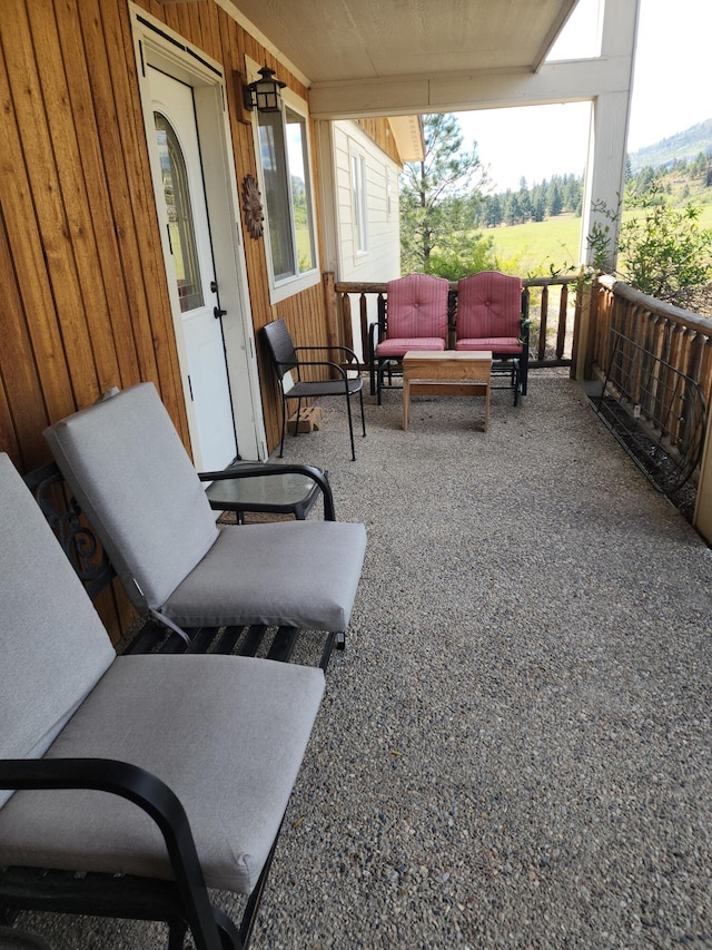 view of patio featuring a porch