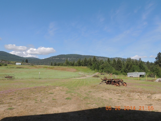 view of mountain feature featuring a rural view