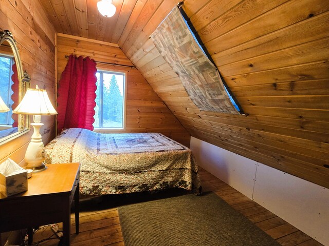 3434 Rockcut Rd, Kettle Falls, WA 99141 - bedroom featuring wood ceiling, vaulted ceiling, wood walls, and hardwood / wood-style flooring
