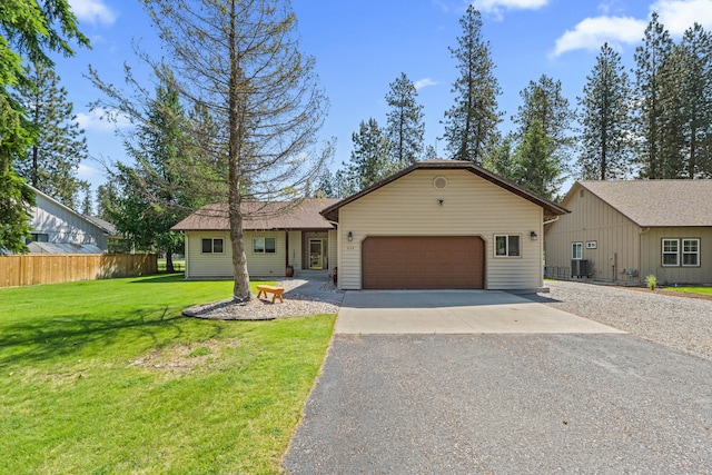 325 Hogans Way, Chewelah, WA 99109 - ranch-style home with asphalt driveway and an attached garage