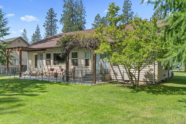 325 Hogans Way, Chewelah, WA 99109 - view of front of property with a patio and board and batten siding
