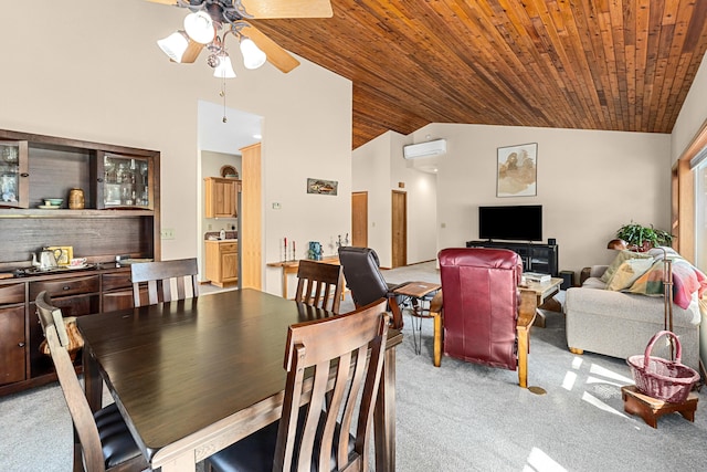 325 Hogans Way, Chewelah, WA 99109 - dining room featuring light colored carpet, ceiling fan, wood ceiling, a wall mounted air conditioner, and high vaulted ceiling