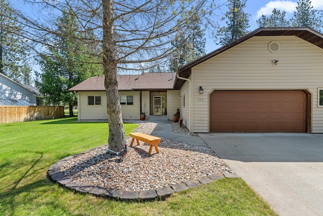 325 Hogans Way, Chewelah, WA 99109 - ranch-style house with concrete driveway, a garage, and a shingled roof