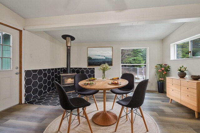4087 Hesseltine Rd, Valley, WA 99181 - dining room with a wood stove and wood finished floors