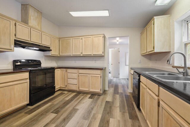 4087 Hesseltine Rd, Valley, WA 99181 - kitchen with under cabinet range hood, a sink, light brown cabinetry, and black appliances
