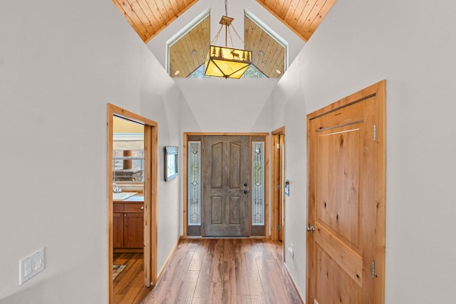 1157 Orin-Rice Rd, Colville, WA 99114 - entrance foyer featuring wooden ceiling, wood-type flooring, and high vaulted ceiling
