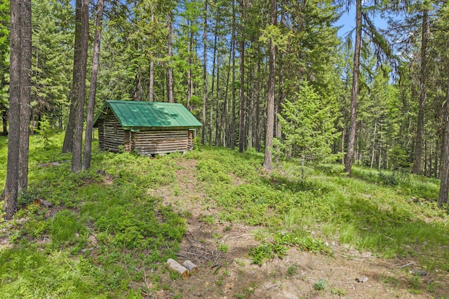 1157 Orin-Rice Rd, Colville, WA 99114 - view of yard with a storage shed and a view of trees