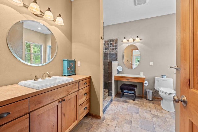 1157 Orin-Rice Rd, Colville, WA 99114 - bathroom with stone tile floors, vanity, and tiled shower