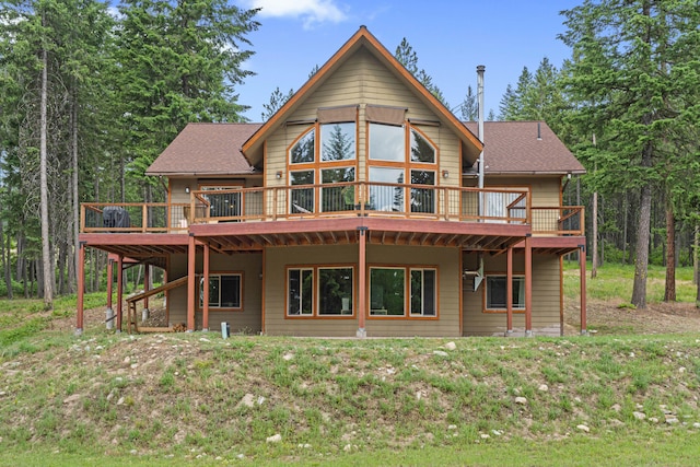 1157 Orin-Rice Rd, Colville, WA 99114 - rear view of house with a wooden deck and a shingled roof