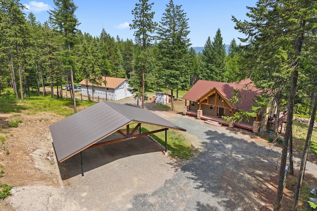 1157 Orin-Rice Rd, Colville, WA 99114 - view of front of property featuring a wooded view and gravel driveway