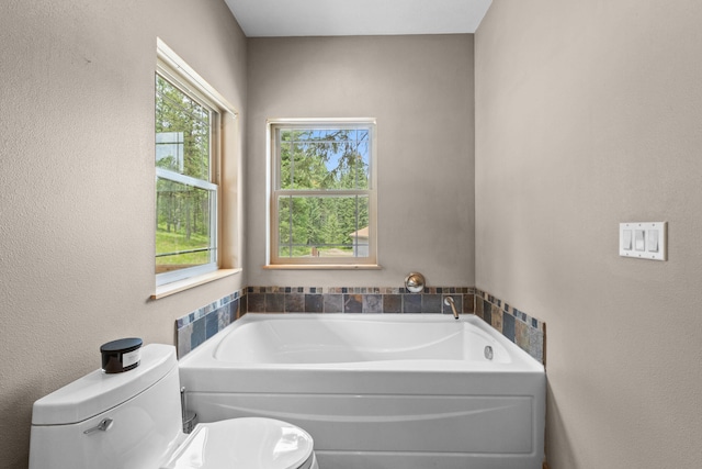 1157 Orin-Rice Rd, Colville, WA 99114 - bathroom featuring toilet and a garden tub