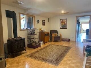 3164 Denney Ranch Way, Kettle Falls, WA 99141 - living area featuring a wood stove and recessed lighting