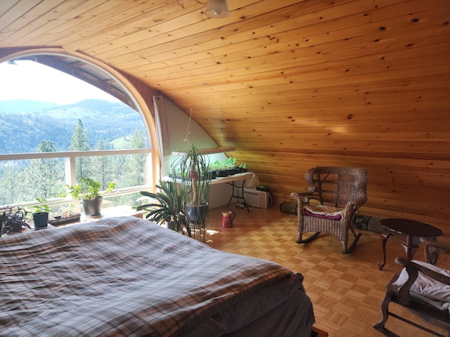 3164 Denney Ranch Way, Kettle Falls, WA 99141 - bedroom with lofted ceiling, a mountain view, and wood ceiling