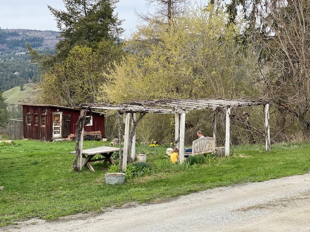 3164 Denney Ranch Way, Kettle Falls, WA 99141 - view of grassy yard featuring a view of trees