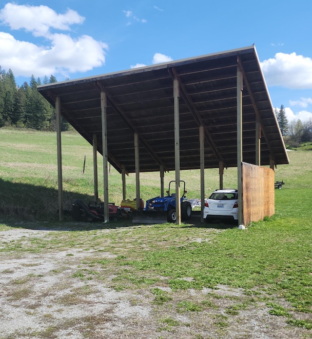 3164 Denney Ranch Way, Kettle Falls, WA 99141 - view of parking featuring dirt driveway and a detached carport