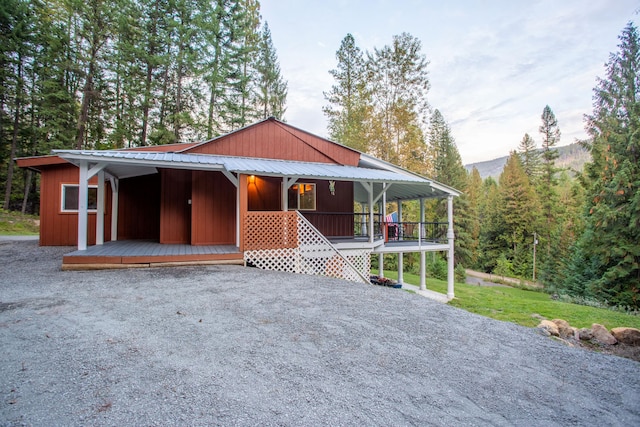 view of front facade with a mountain view and a porch