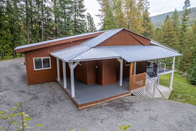 exterior space featuring a mountain view