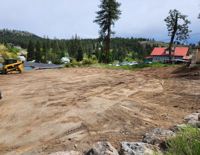 720 S Jefferson St, Republic, WA 99166 - view of yard featuring a wooded view
