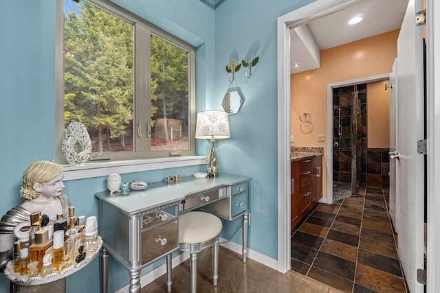 home office featuring baseboards and recessed lighting