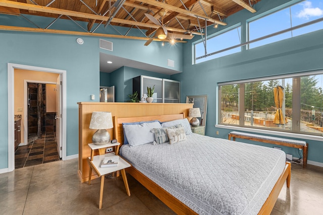 bedroom featuring beamed ceiling, concrete flooring, baseboards, wood ceiling, and high vaulted ceiling